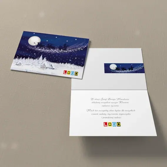 Kartka świąteczna z logo BN1-358 Sanie nad śnieżną wsią, widok ogólny