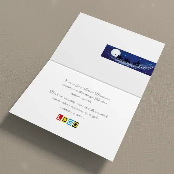 Kartka świąteczna z logo BN1-358 Sanie nad śnieżną wsią, wnętrze